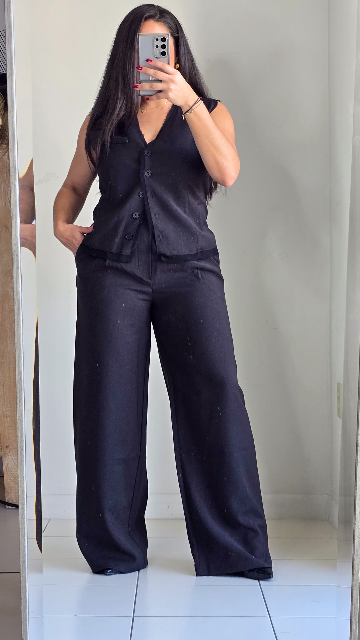 Black trousers with cut edge detail